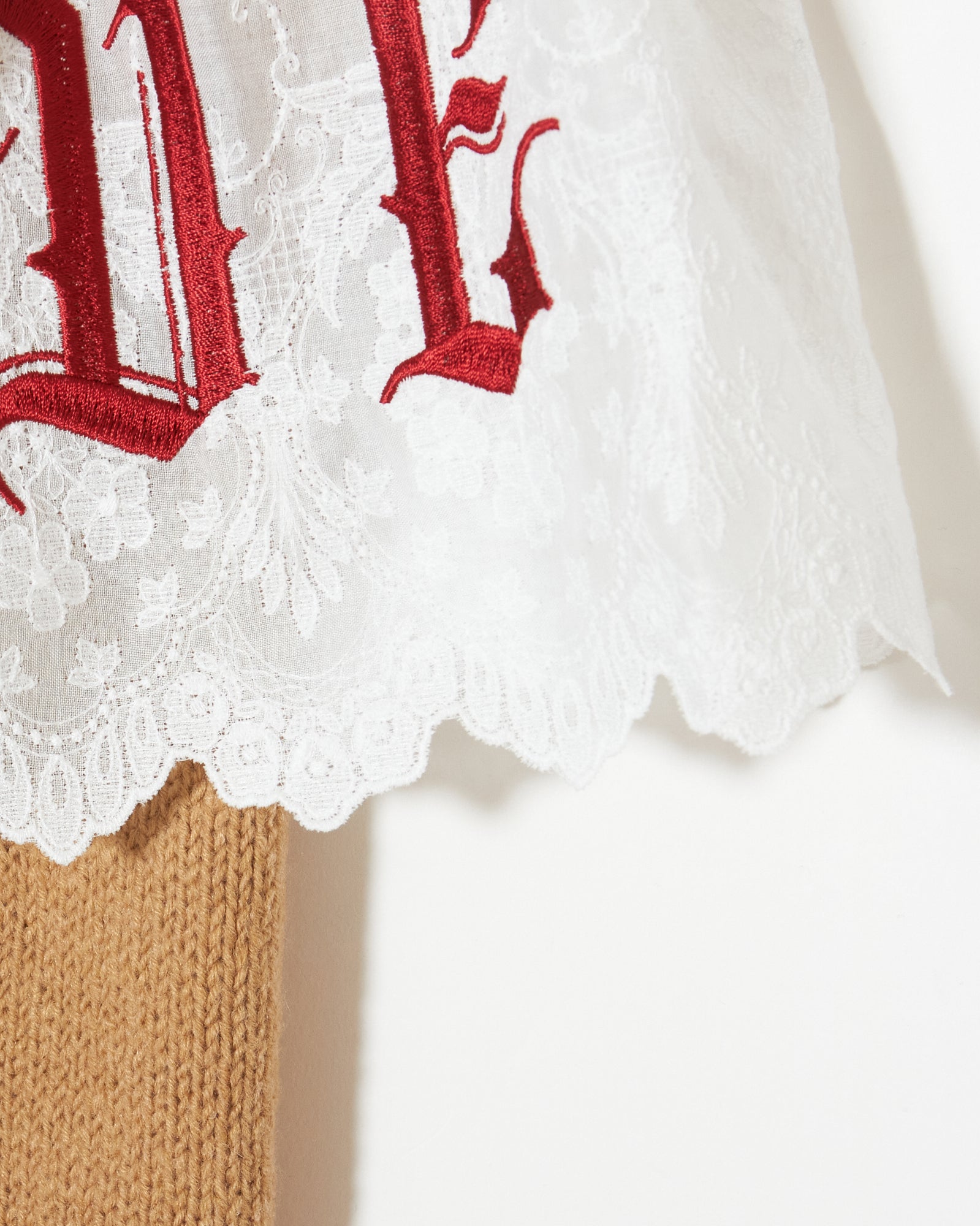 tanakadaisuke red LOVE arm warmer beige