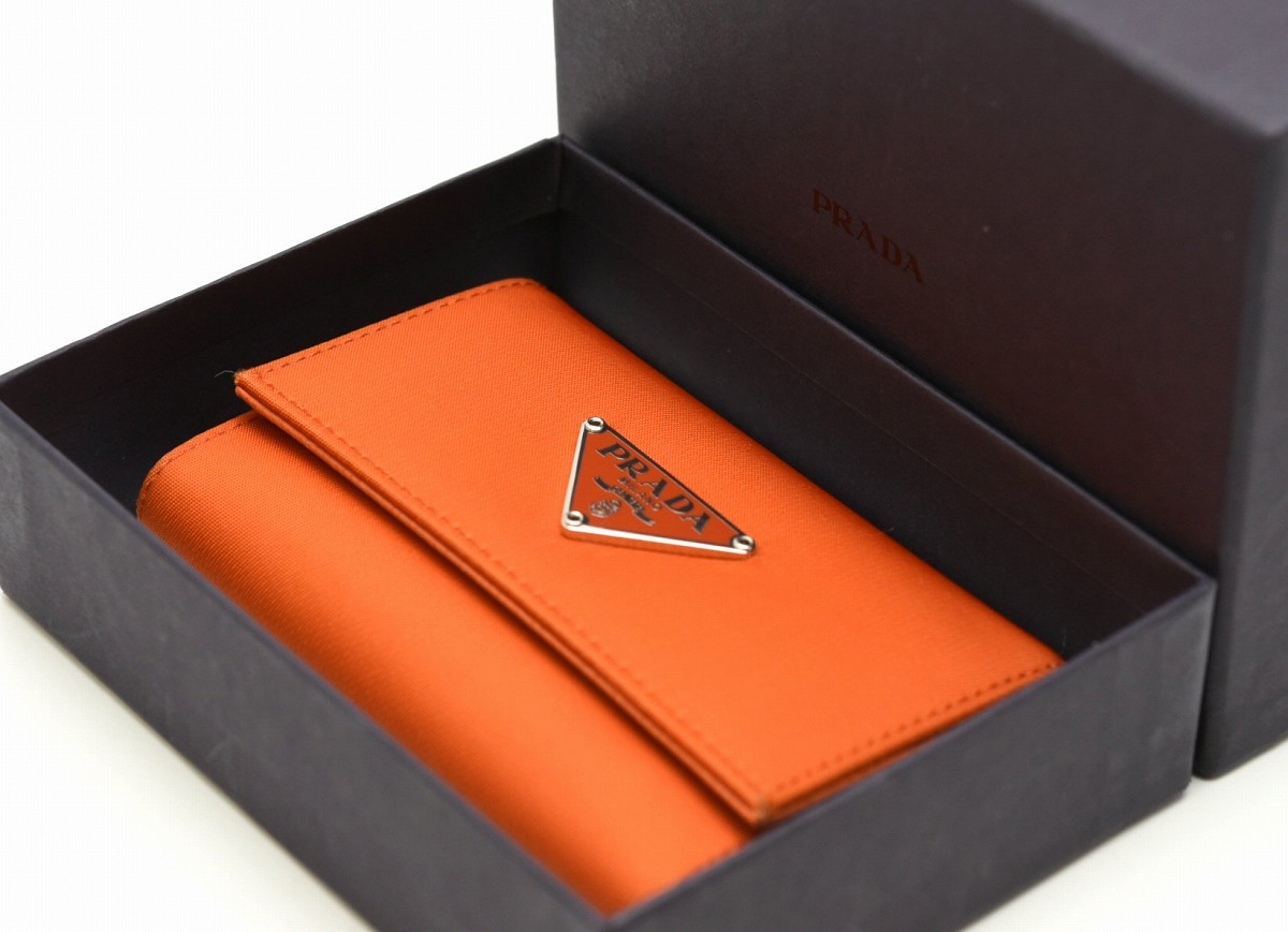 楽天市場】PRADA プラダ 6連キーケース SAFFIANO ナイロン CORALLO