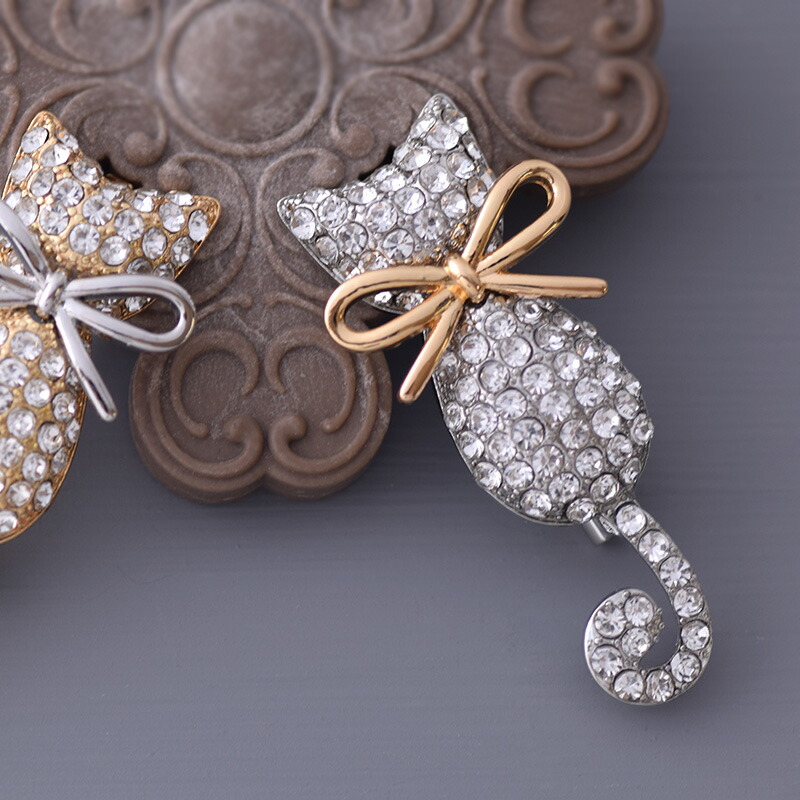 楽天市場】ブローチ ねこ ラインストーン かわいい リボン シルバー