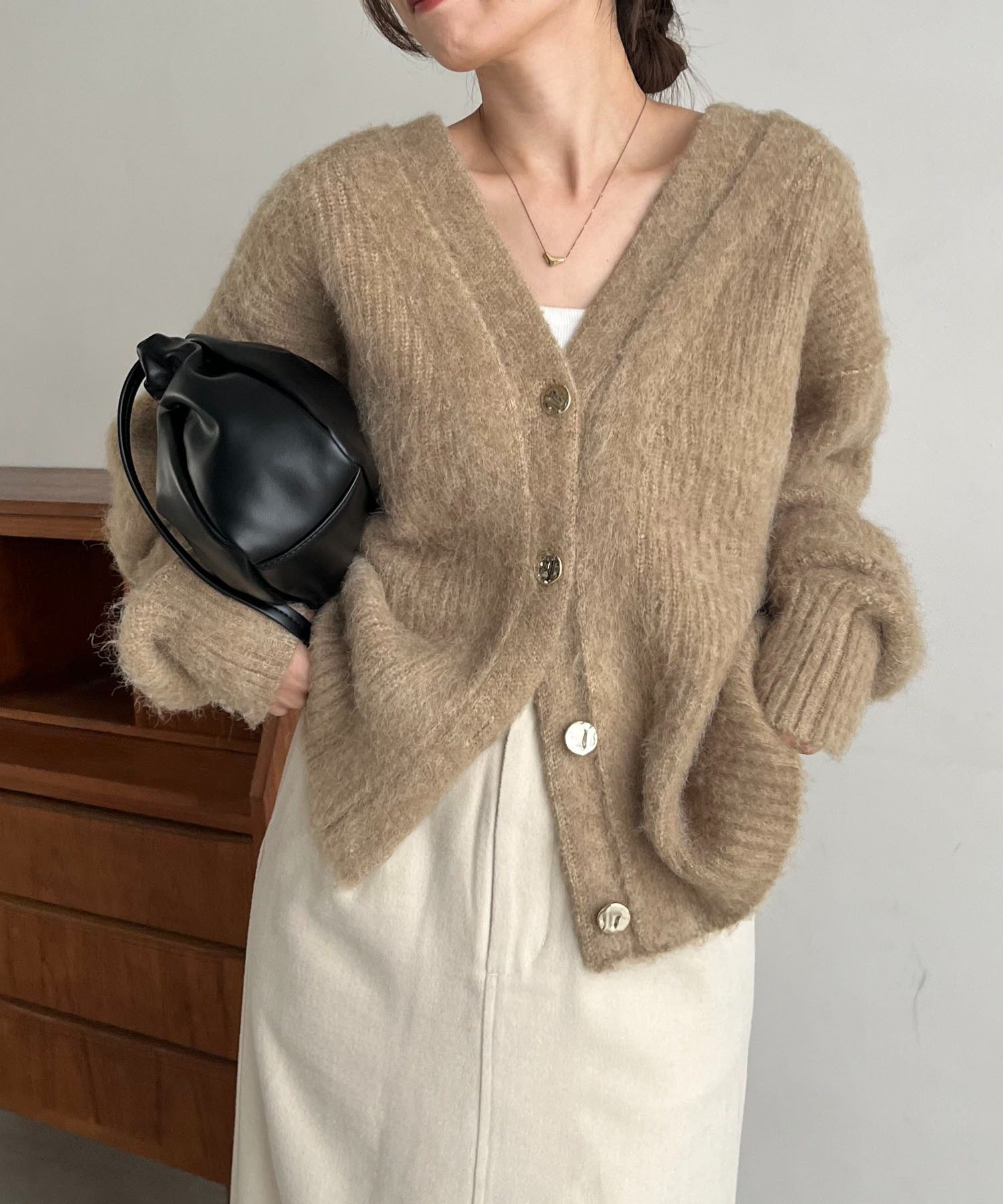CAPRICIEUX LE'MAGE｜ニュアンスボタンレイヤード風カーディガン