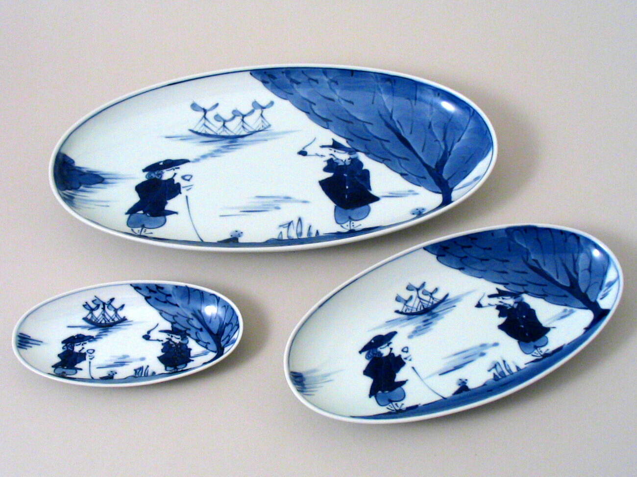 楽天市場】【有田焼】【青花】【しん窯】二人異人小判焼皿 【ギフト