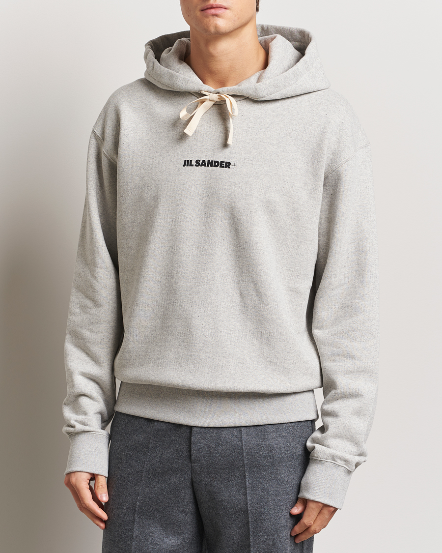 Jil Sander Small Logo Cotton Hoodie Light Grey at CareOfCarl.com