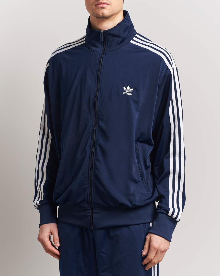 adidas Originals Firebird Track Jacket Navy at CareOfCarl.com