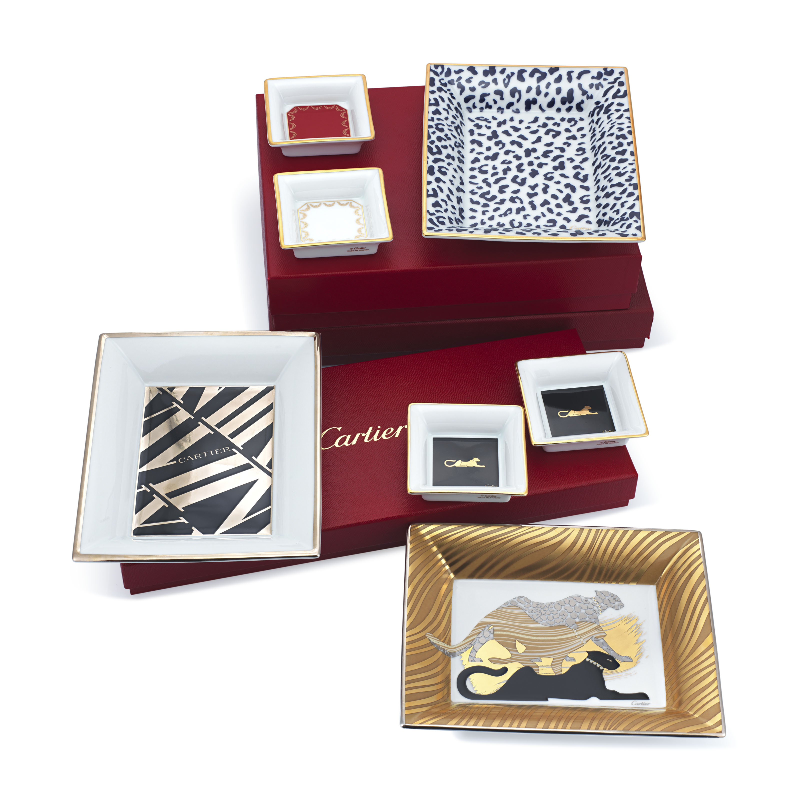 GROUP OF CARTIER TRINKET TRAYS, | Christie's