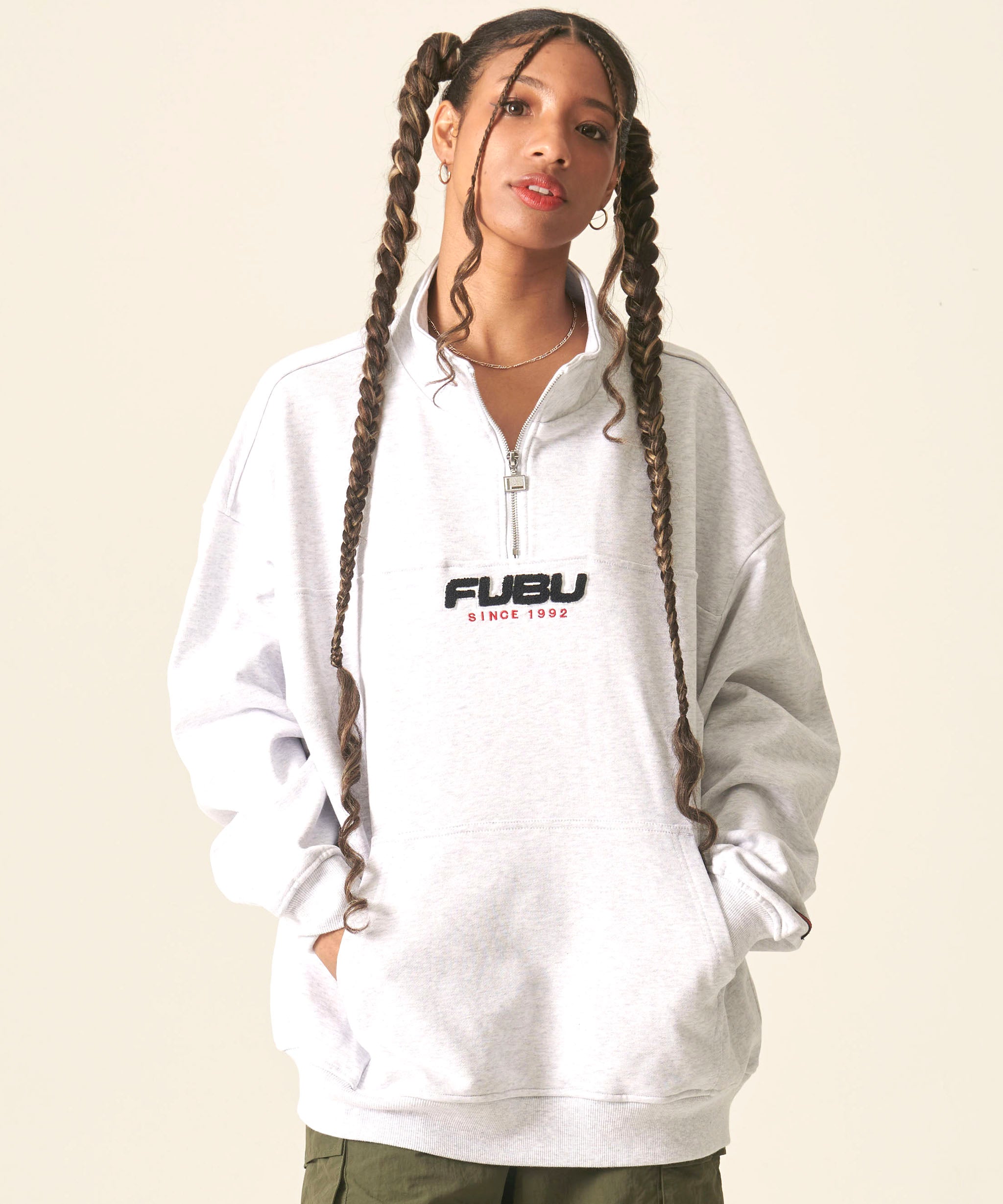 FUBU フブ トップス 裏毛 ハーフジップ スウェット。FUBUはアメリカの
