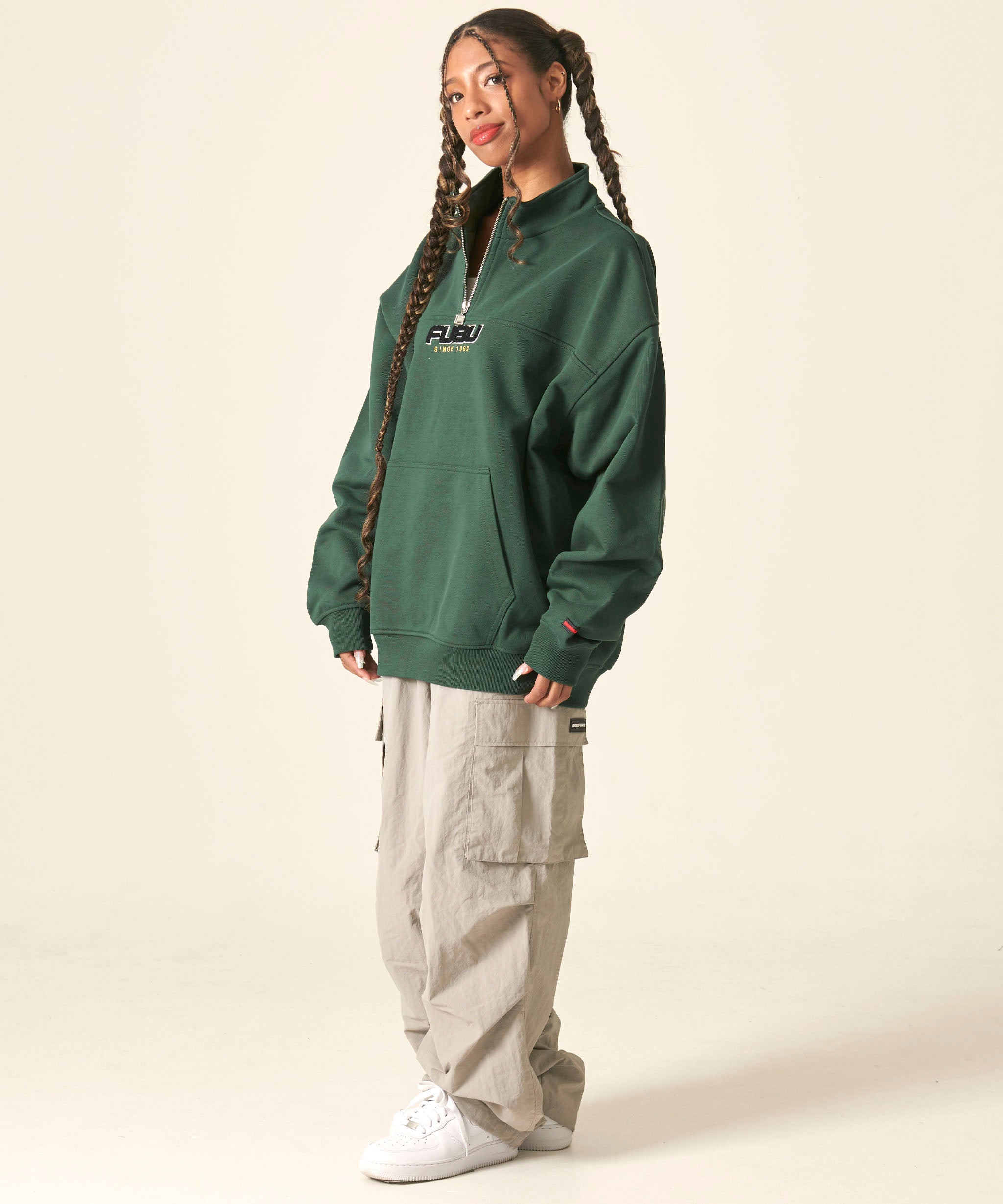 FUBU フブ トップス 裏毛 ハーフジップ スウェット。FUBUはアメリカの