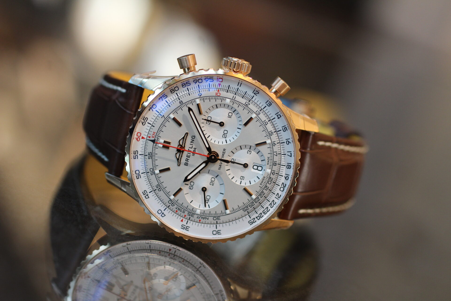ブライトリング】18Kゴールドベゼルと革ベルトの組み合わせが