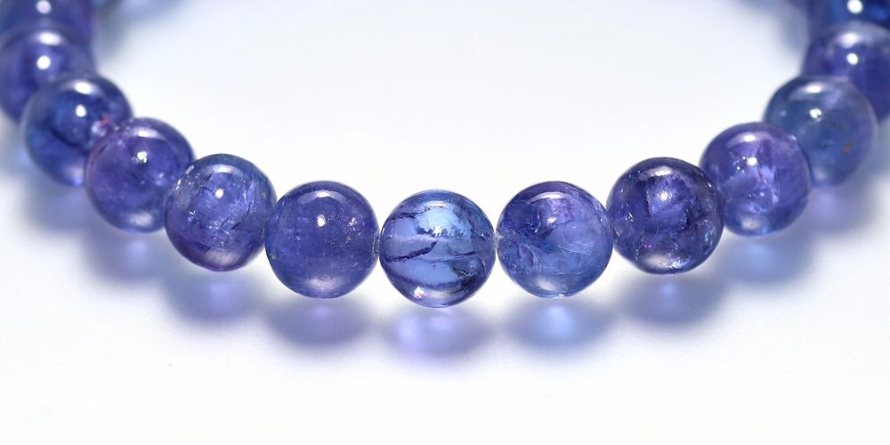 トップクォリティ]宝石質タンザナイトブレスレット（約8mm玉・一部表面