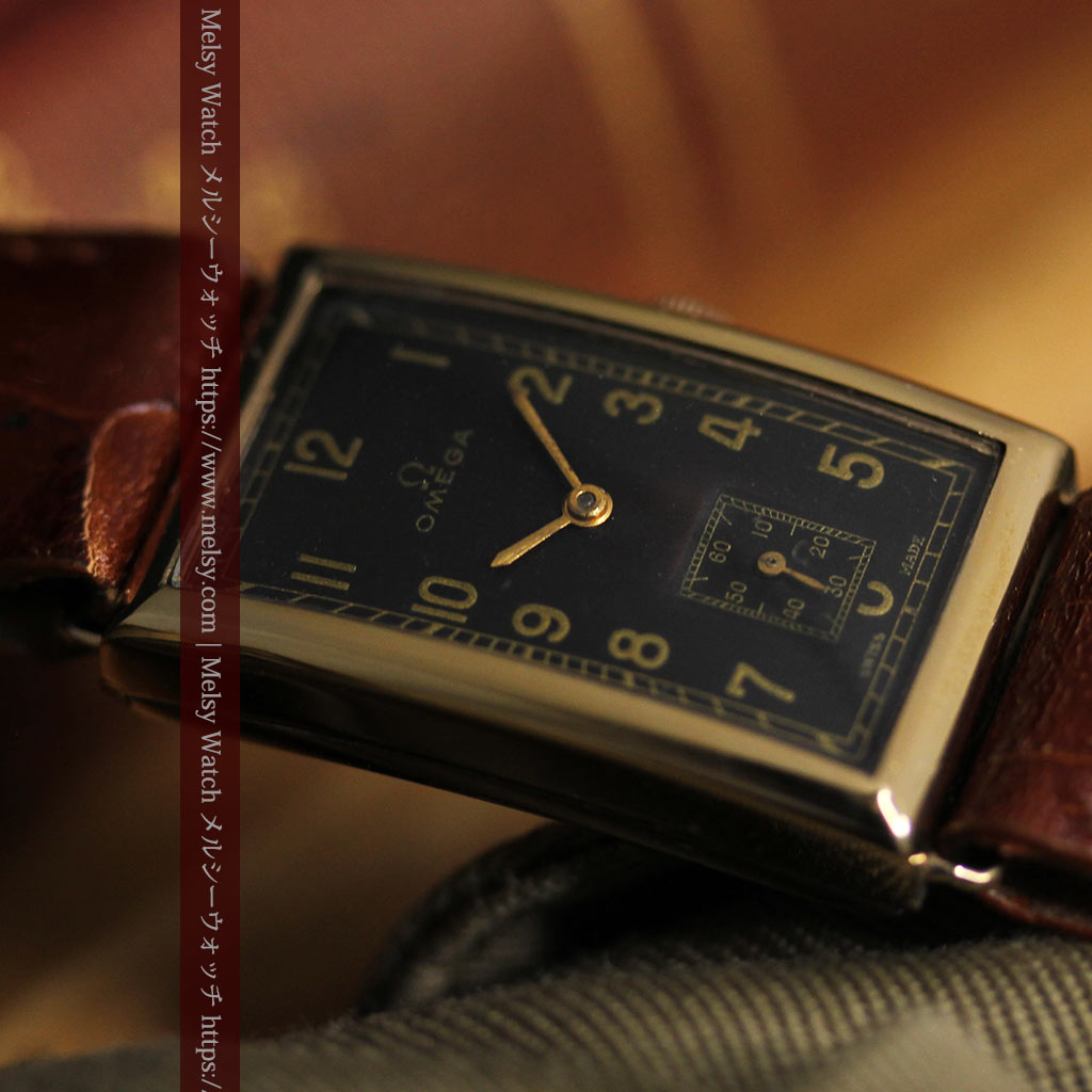 オメガのシックな黒色文字盤 品ある縦長アンティーク腕時計 【1940年製】