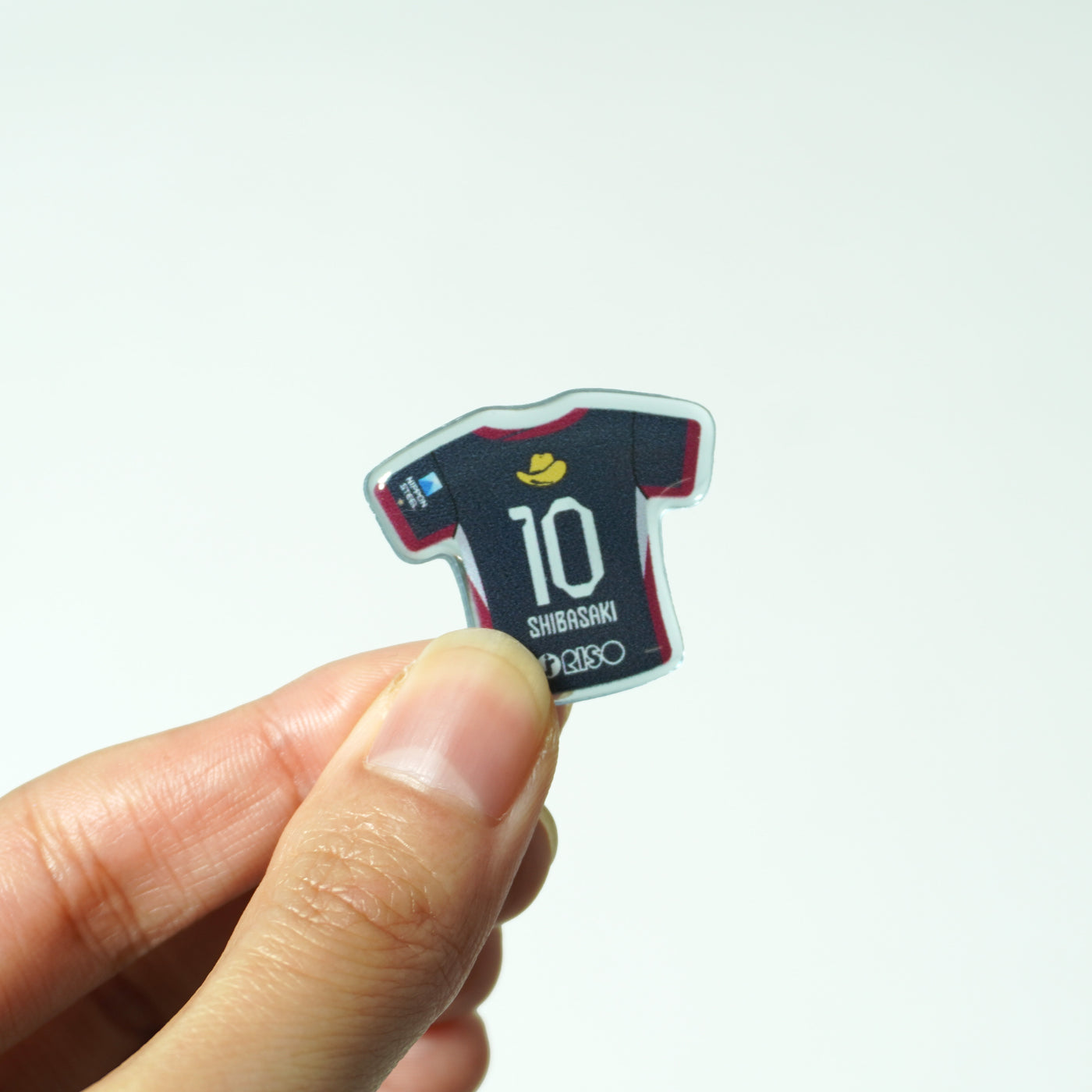 ブラインド】26ユニフォームピンバッジ（1st） – 鹿島アントラーズFC