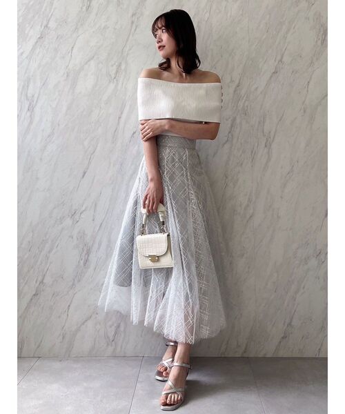 dazzlin（ダズリン）の「スパンコールチュールチェックスカート