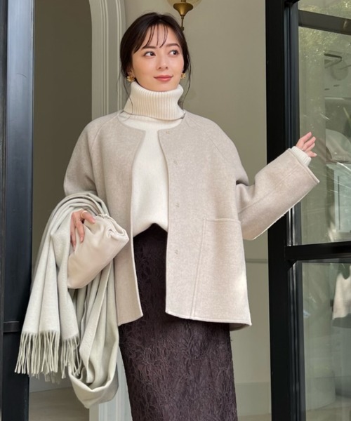 anuans（アニュアンス）の「ノーカラーリバーショートコート（ノー