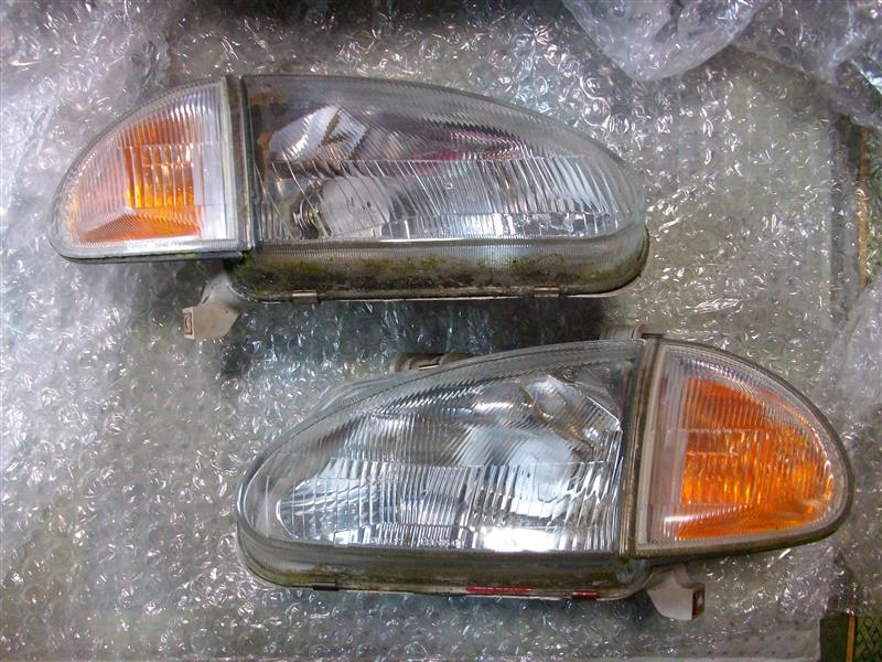 UK仕様 中古 ｶﾞﾗｽ 製 ﾍｯﾄﾞﾗｲﾄ・ﾕﾆｯﾄ 装着（ホンダ CR-Xデルソル・EG1