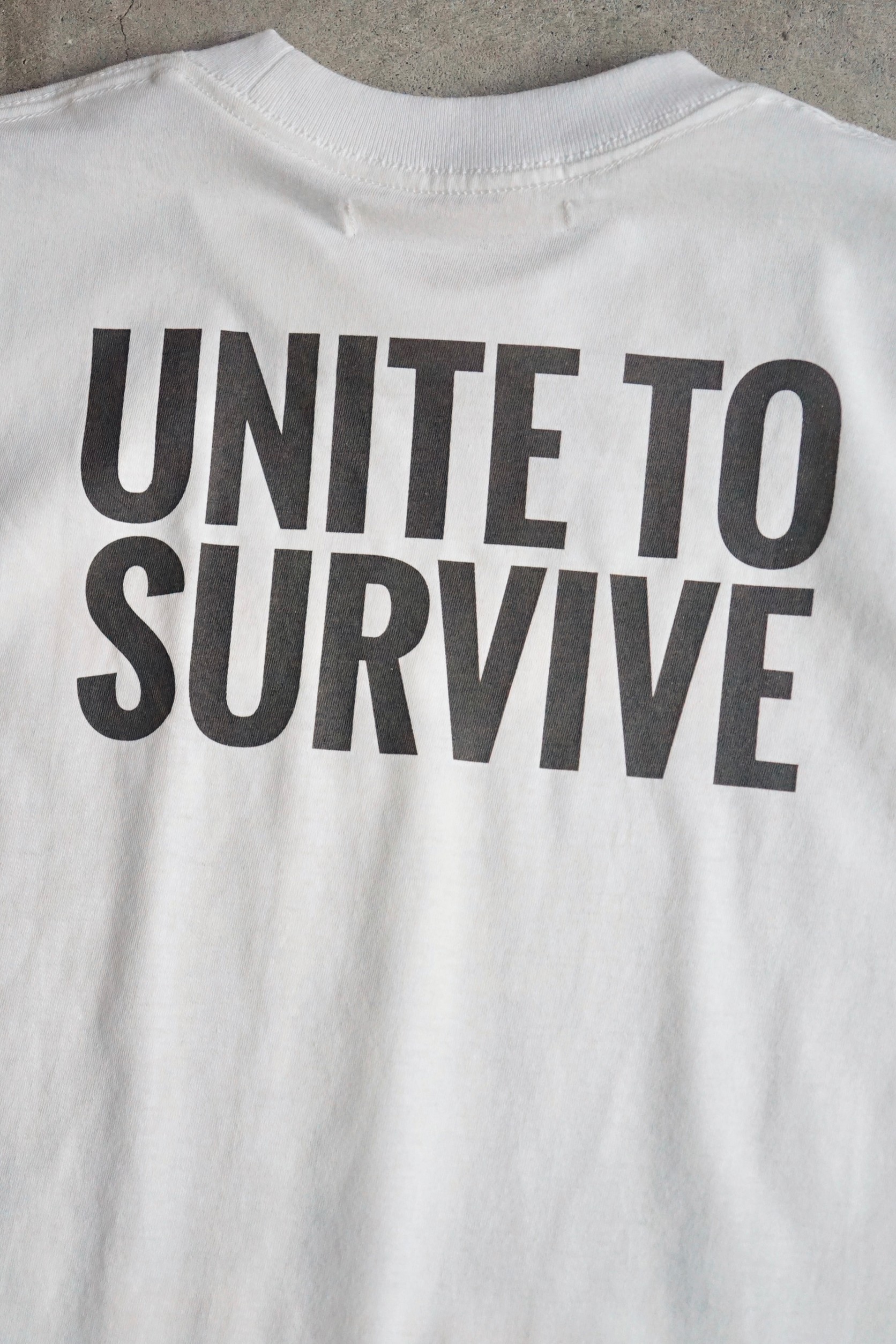 XS/M RESTOCK】ACTIVISM H/S TEE- UNITE TO SURVIVE / DEPT Online Store