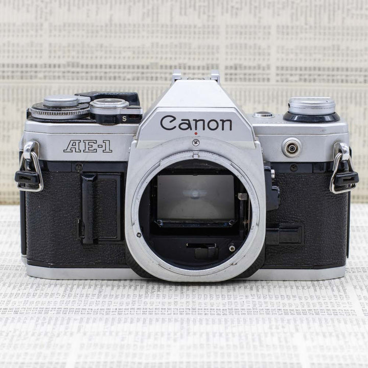 Canon AE-1 with Motor Drive & Canon FD 50mm f1.8 Lens – Everything