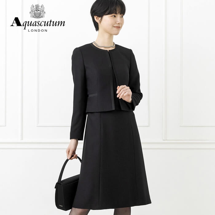 ベーシックな中にモードが薫るアンサンブル 13号・ブラック｜東京