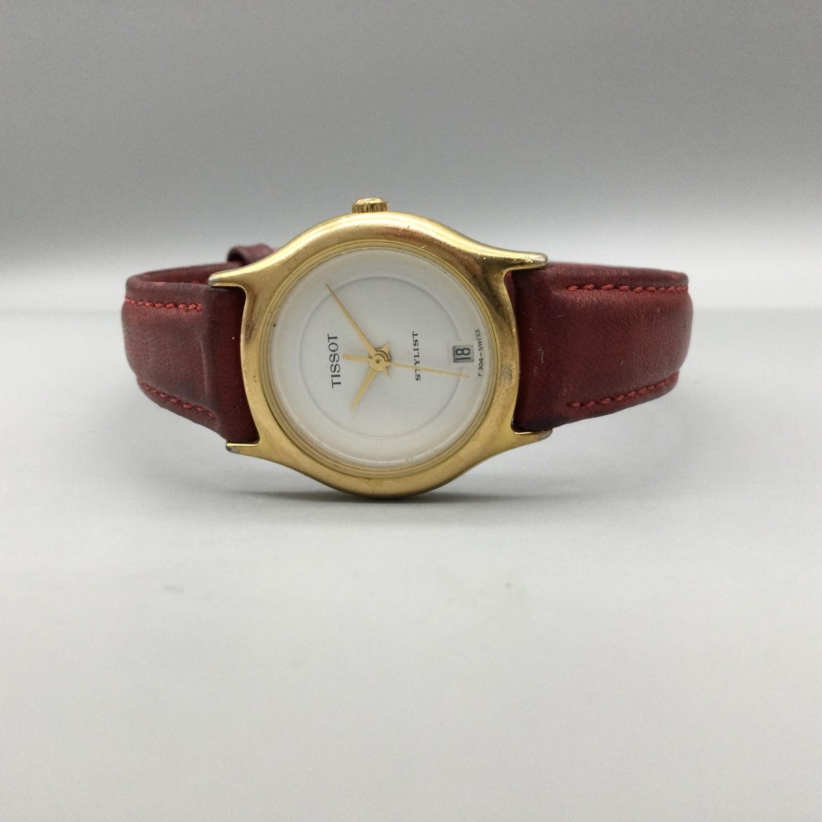 Vtg Tissot Stylist Watch Womens 24mm Gold Tone Date Red Leather