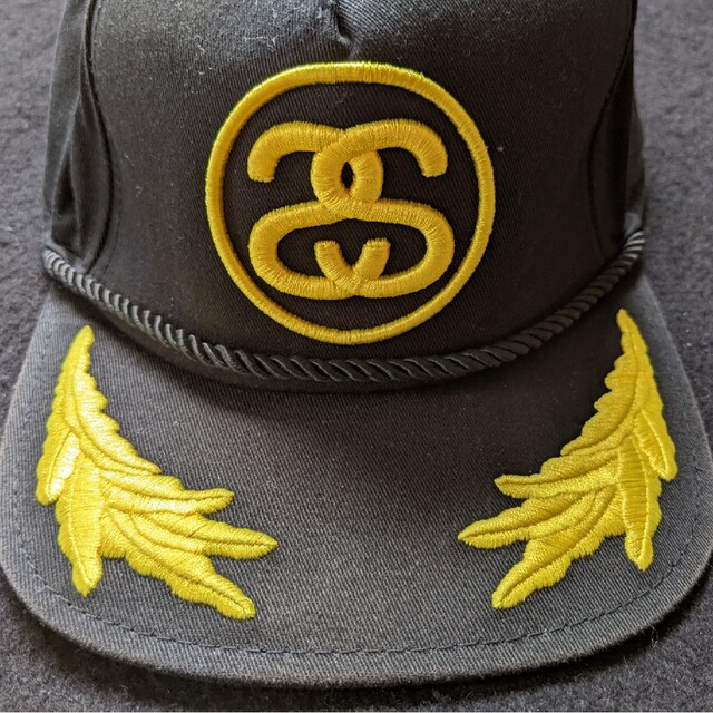 STUSSY - STUSSY シャネルロゴ スター 星 黒色 黄色 キャップ 帽子