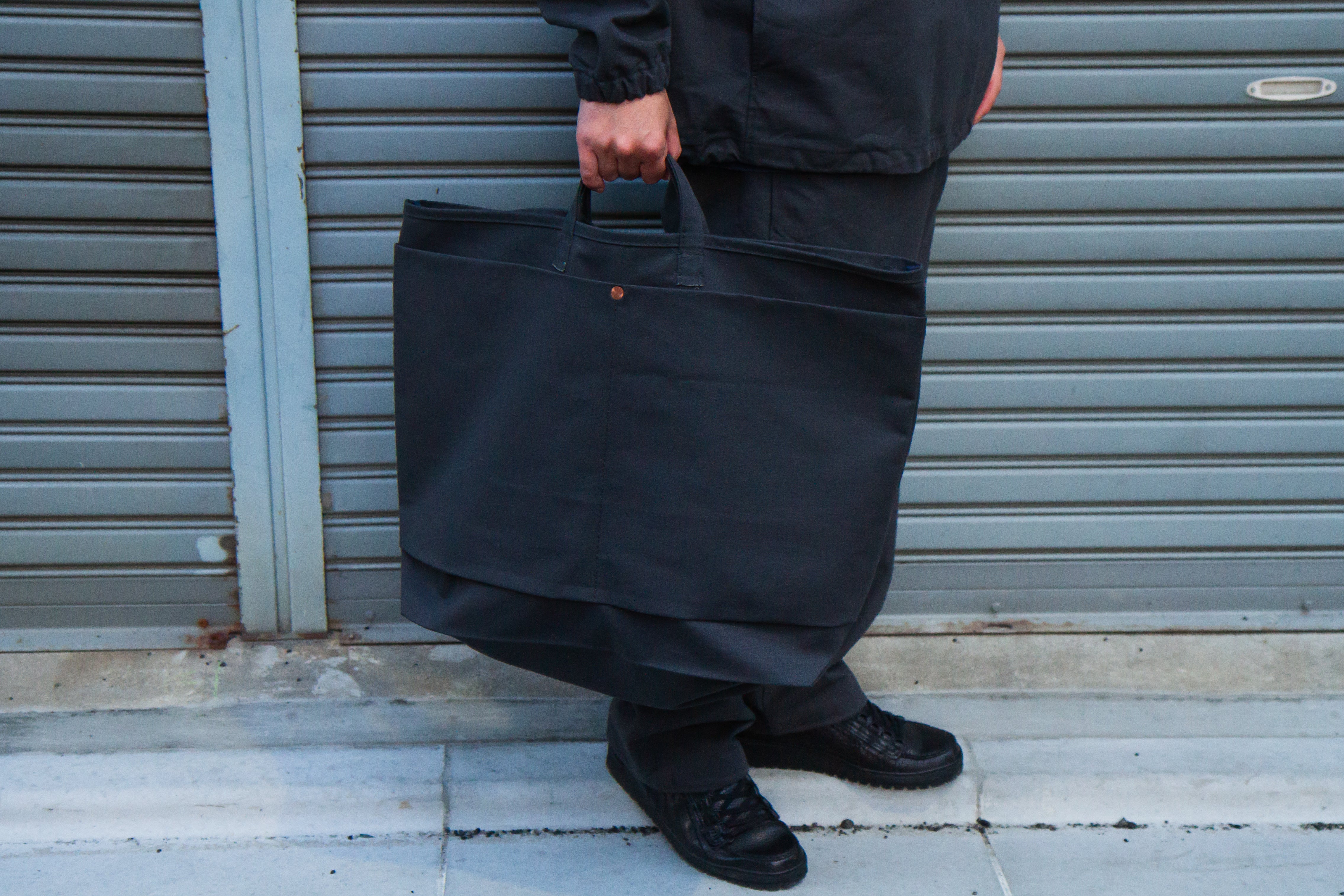 This is a(n)×BLINK ] BASE TOTE LARGE – In part