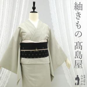 本場大島紬 袷 着物 織絣 横双 手織り 正絹 黒 花 笹 色紙文様