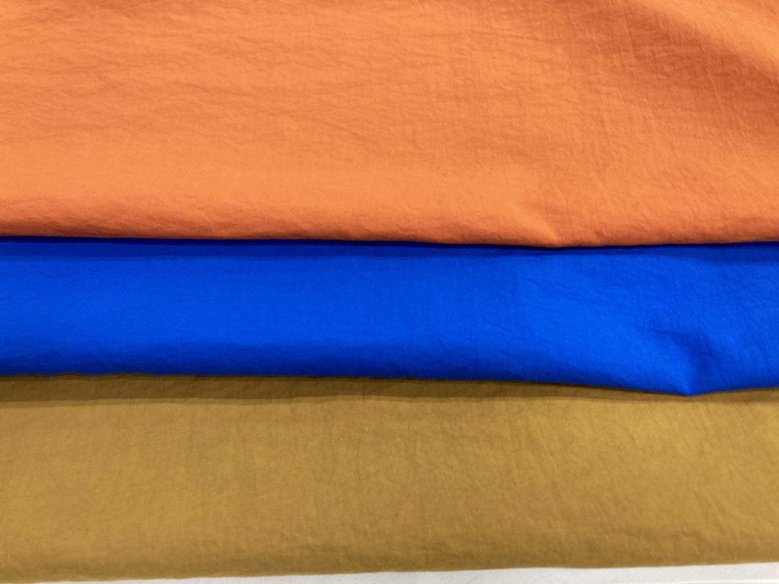 KKF7203WP-W エアリーガードタフタ撥水加工広巾｜無地染｜ナイロン