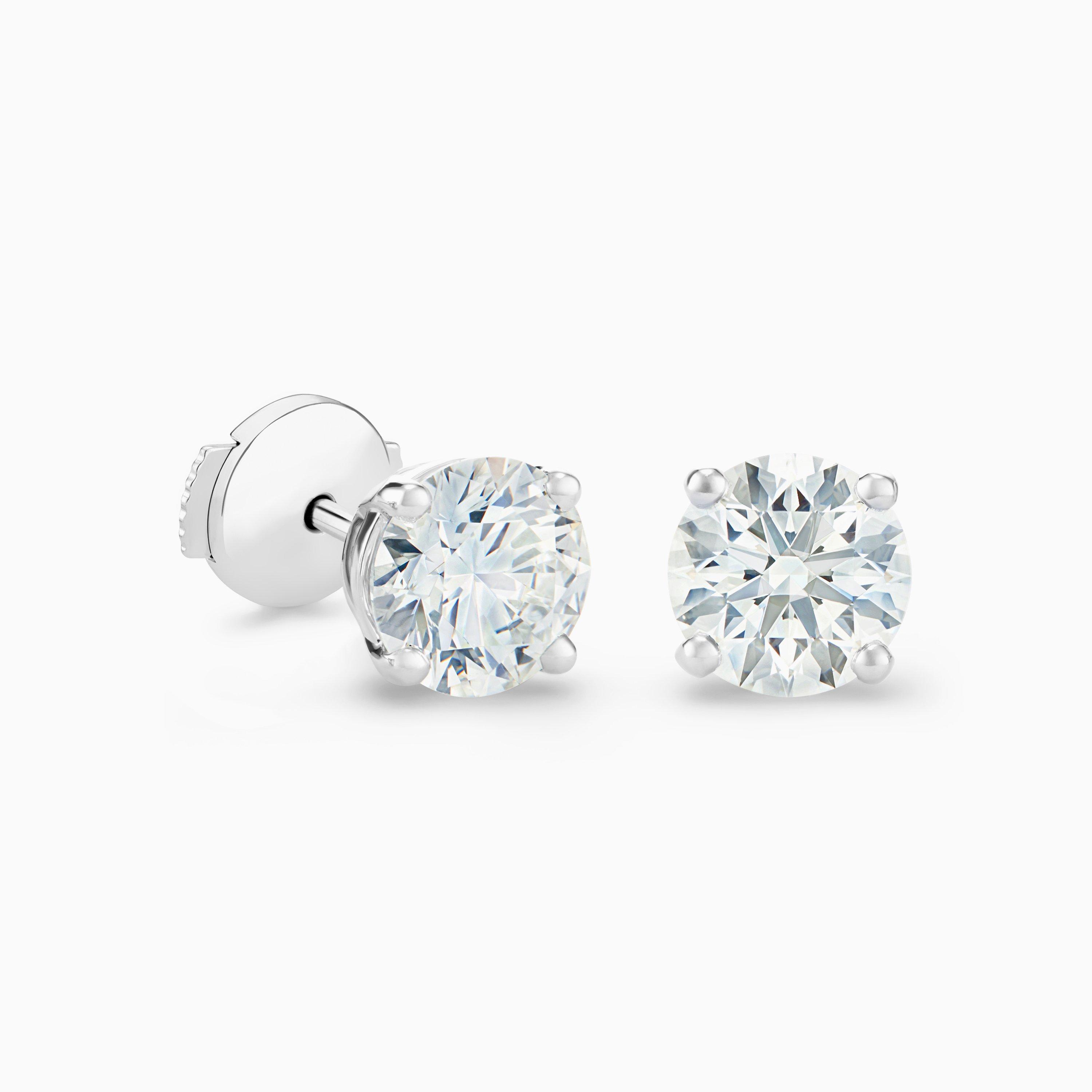 DB Classic round brilliant diamond studs | De Beers US