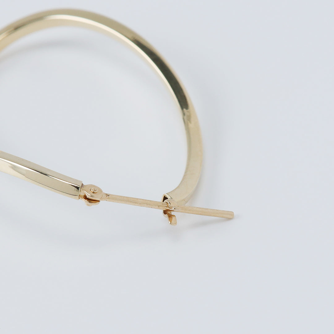 NEW＞K18オーバルツイストフープピアス