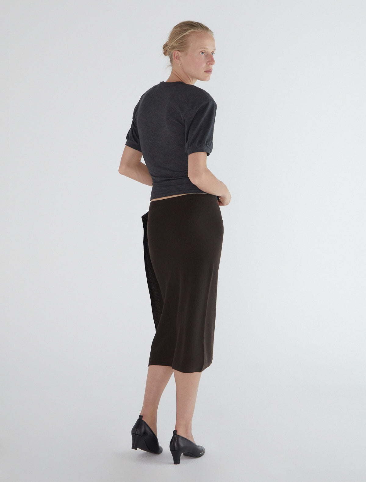 CHARCO-Wrap skirt, featuring side buttons for opening and closure