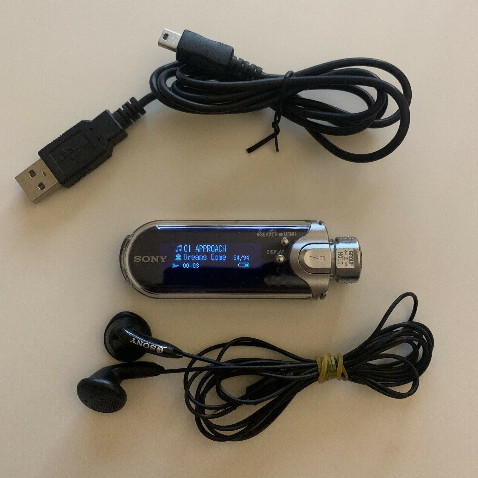 Sony Walkman NW-E405 MP3 Player 512MB + Earphones – Retro Unit