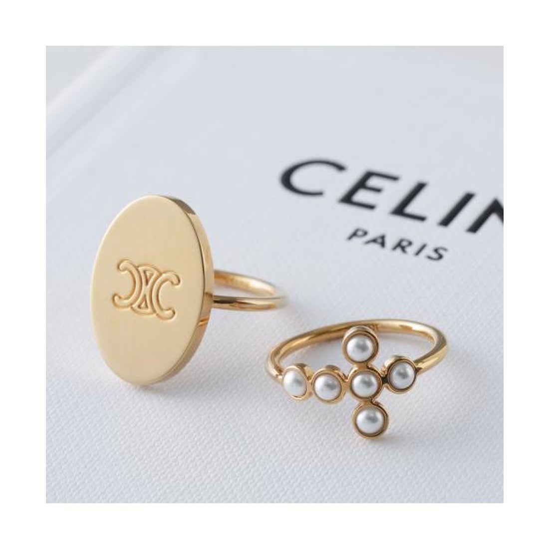 新品】 CELINE トリオンフ付きパール風ボタン ブラウス 36 白