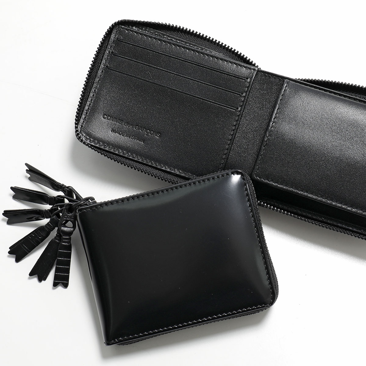 COMME des GARCONS（コムデギャルソン） 二つ折り財布 ZIPPER MEDLEY