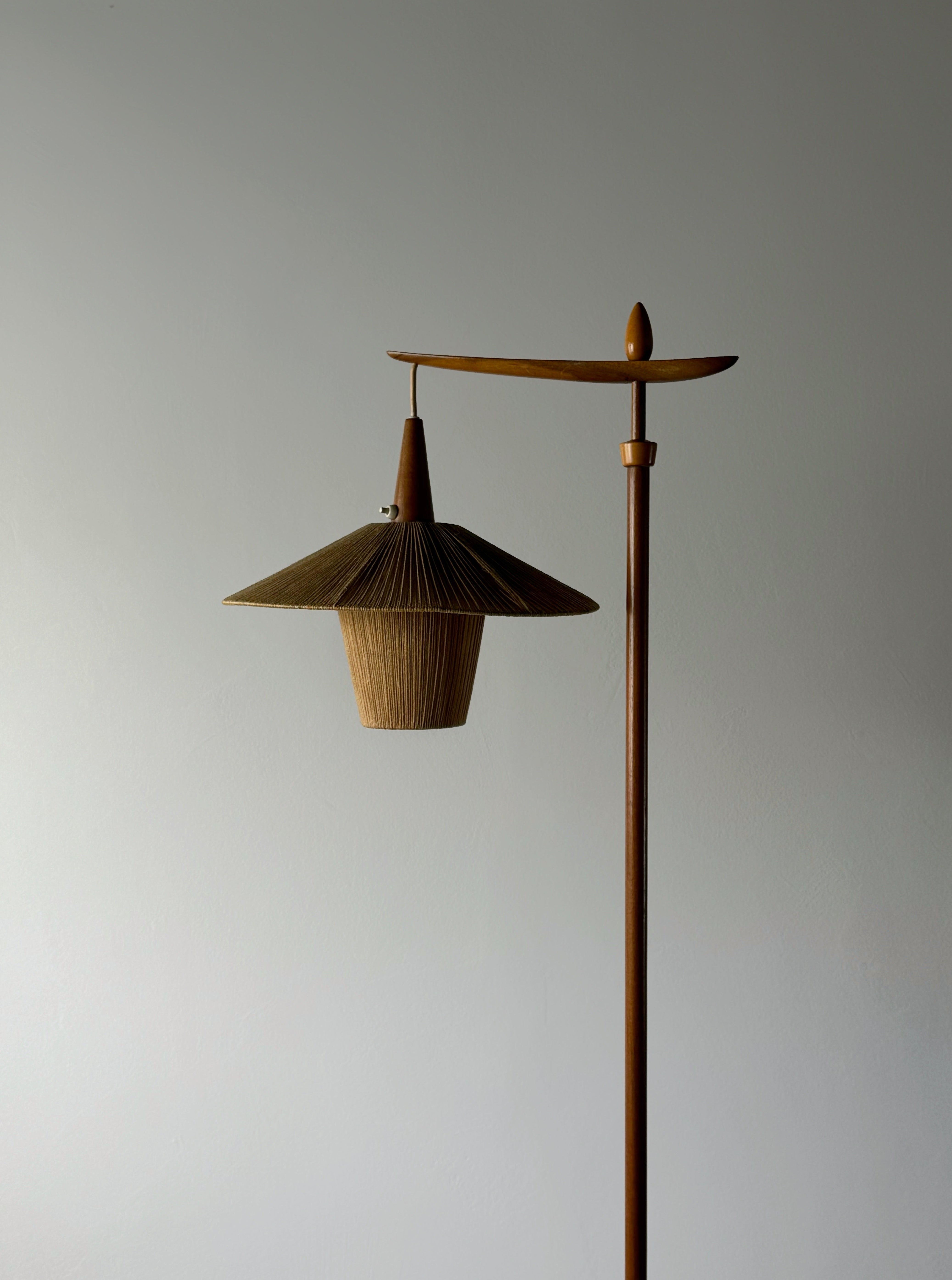 Floor lamp with cord shade manufactured by Temde Leuchten