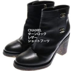 CHANEL 38 2/1ターンロック レザーショートブーツ 黒 - メルカリ