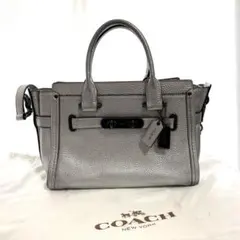 2026年最新】coach スワッガー27の人気アイテム - メルカリ