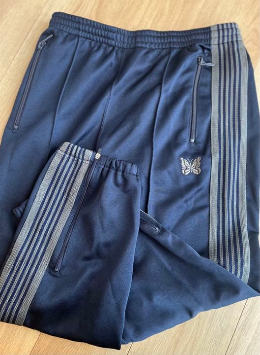 NEEDLES zipped track pant navy