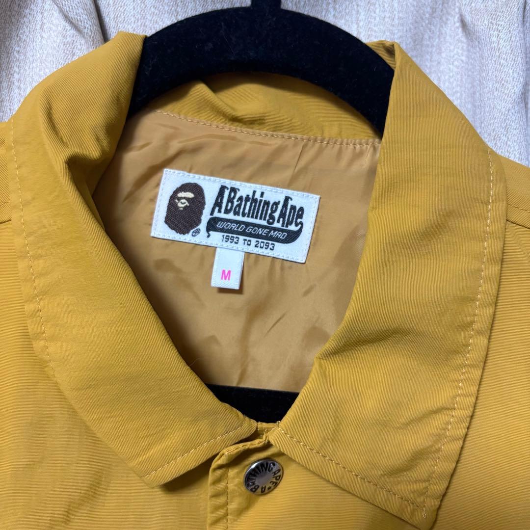 A Bathing Ape ナイロンジャケット M マスタード - メルカリ