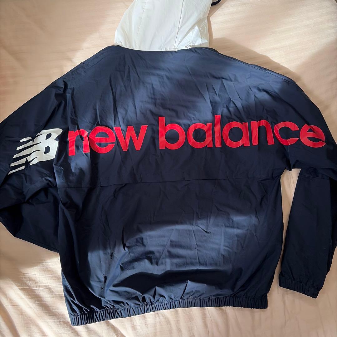 New Balance フード付きナイロンジャケット - メルカリ