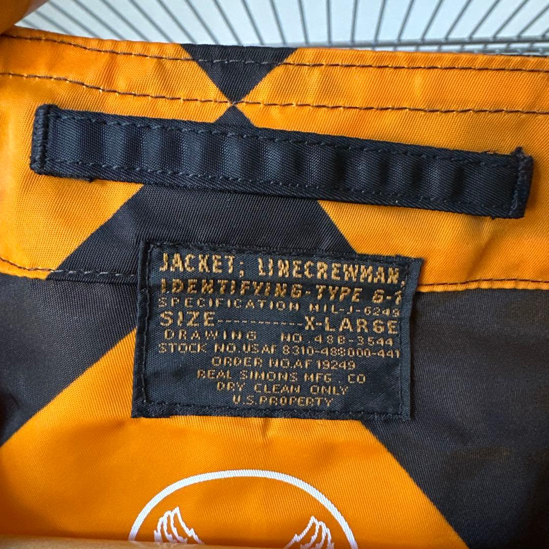XLサイズ REAL SIMONS G1ジャケット オレンジ黒チェック振り旗 - メルカリ