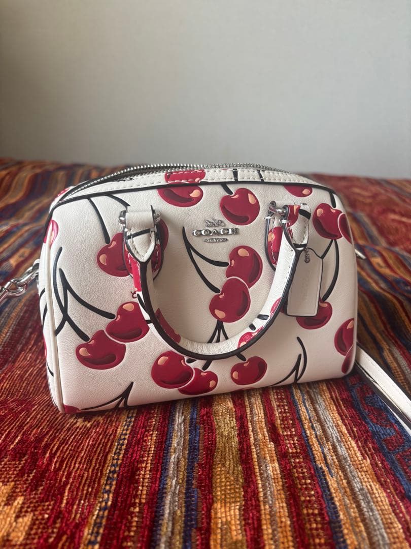 COACH チェリー柄 ショルダーバッグ - メルカリ