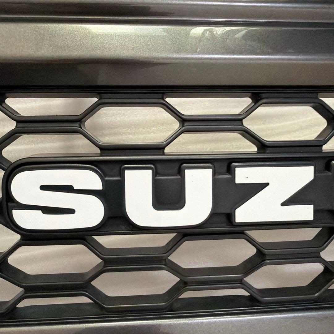 SUZUKI純正オプションフロントグリル ジムニー用 ガンメタ - メルカリ