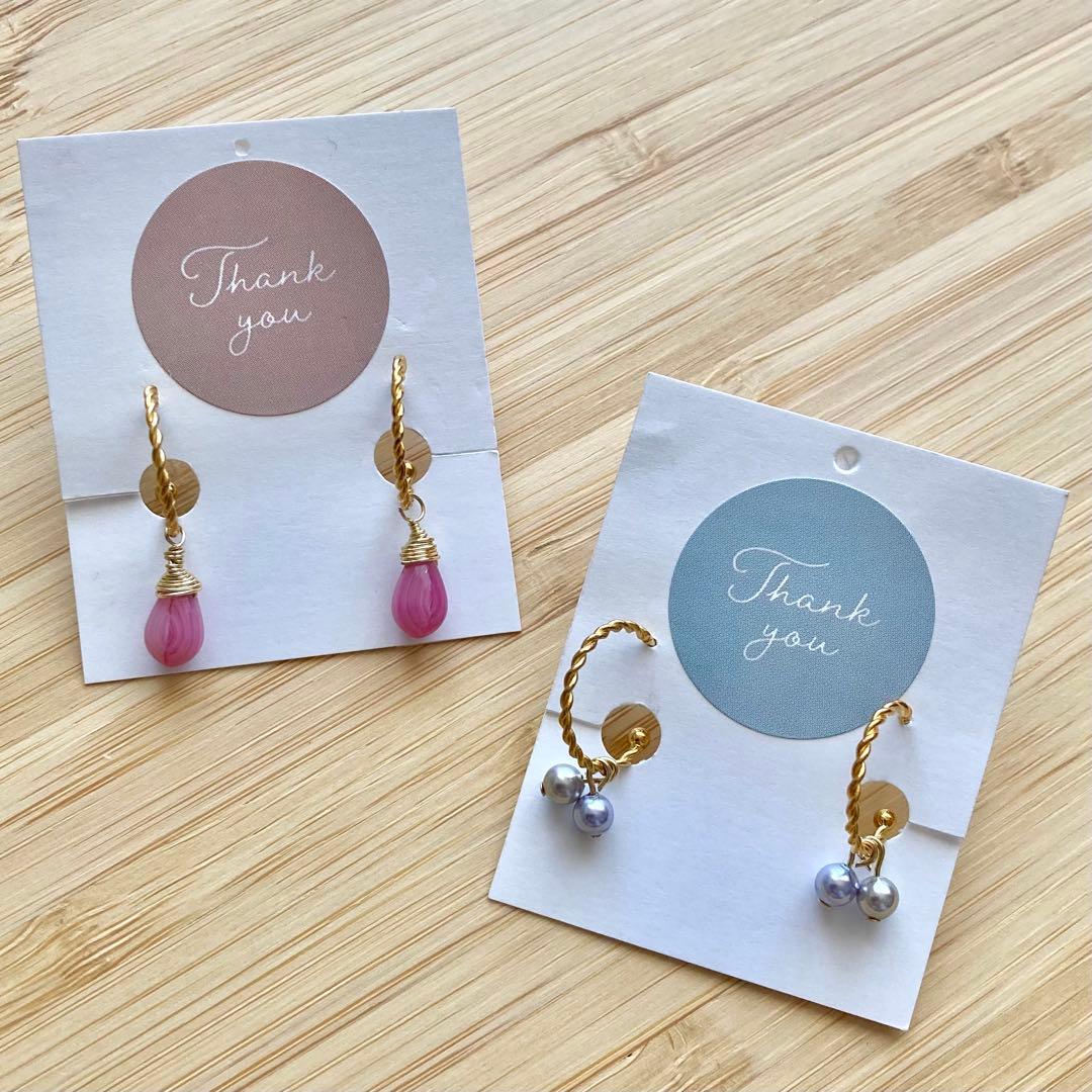 ツイストフープピアス ピンク ゴールド - メルカリ