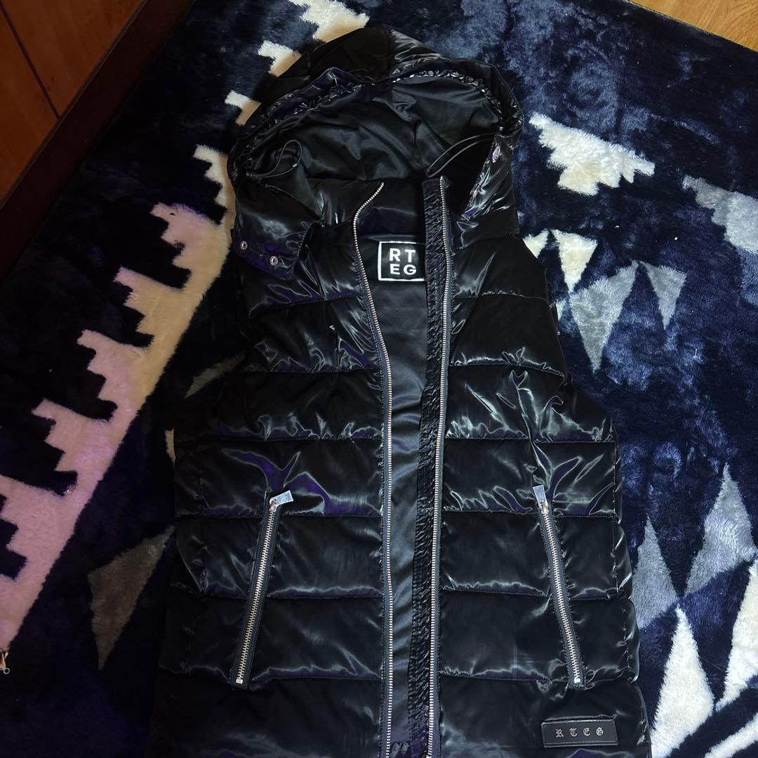 アダムスジャグラーダウンベスト - メルカリ