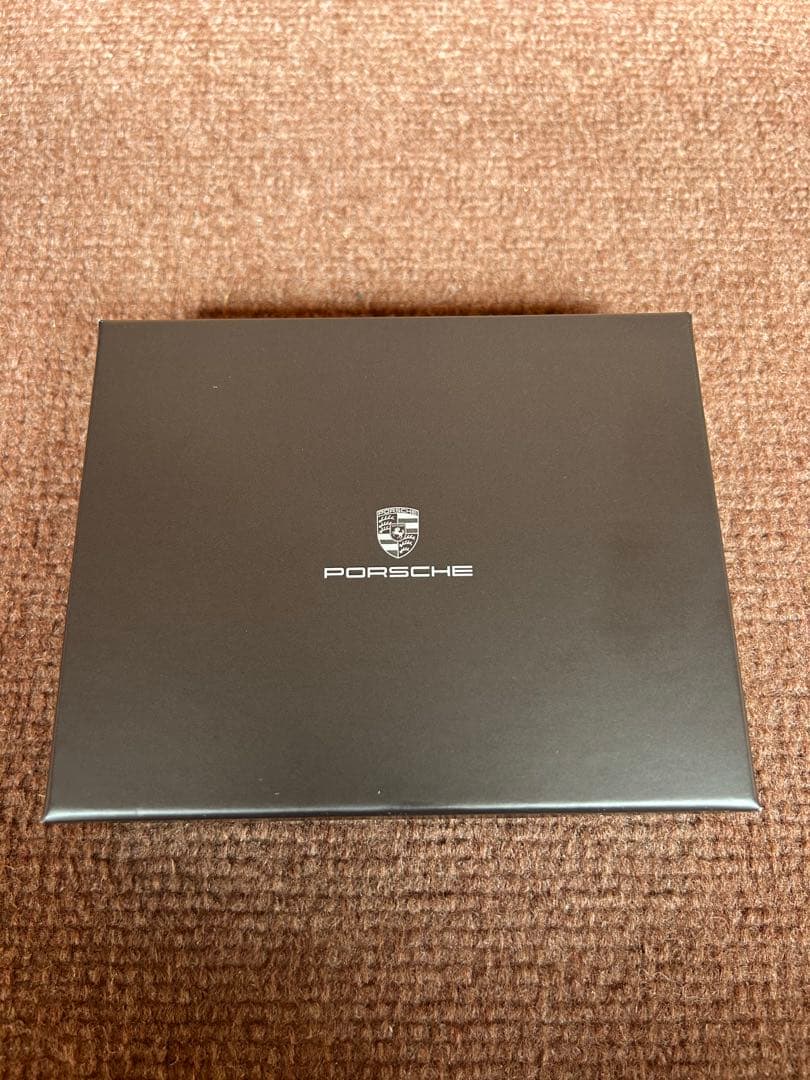 ポルシェ お財布ブラック レザー縦型 楽天市場】【 ポルシェ 純正 】牛革 クレスト 手帳型 ウォレット