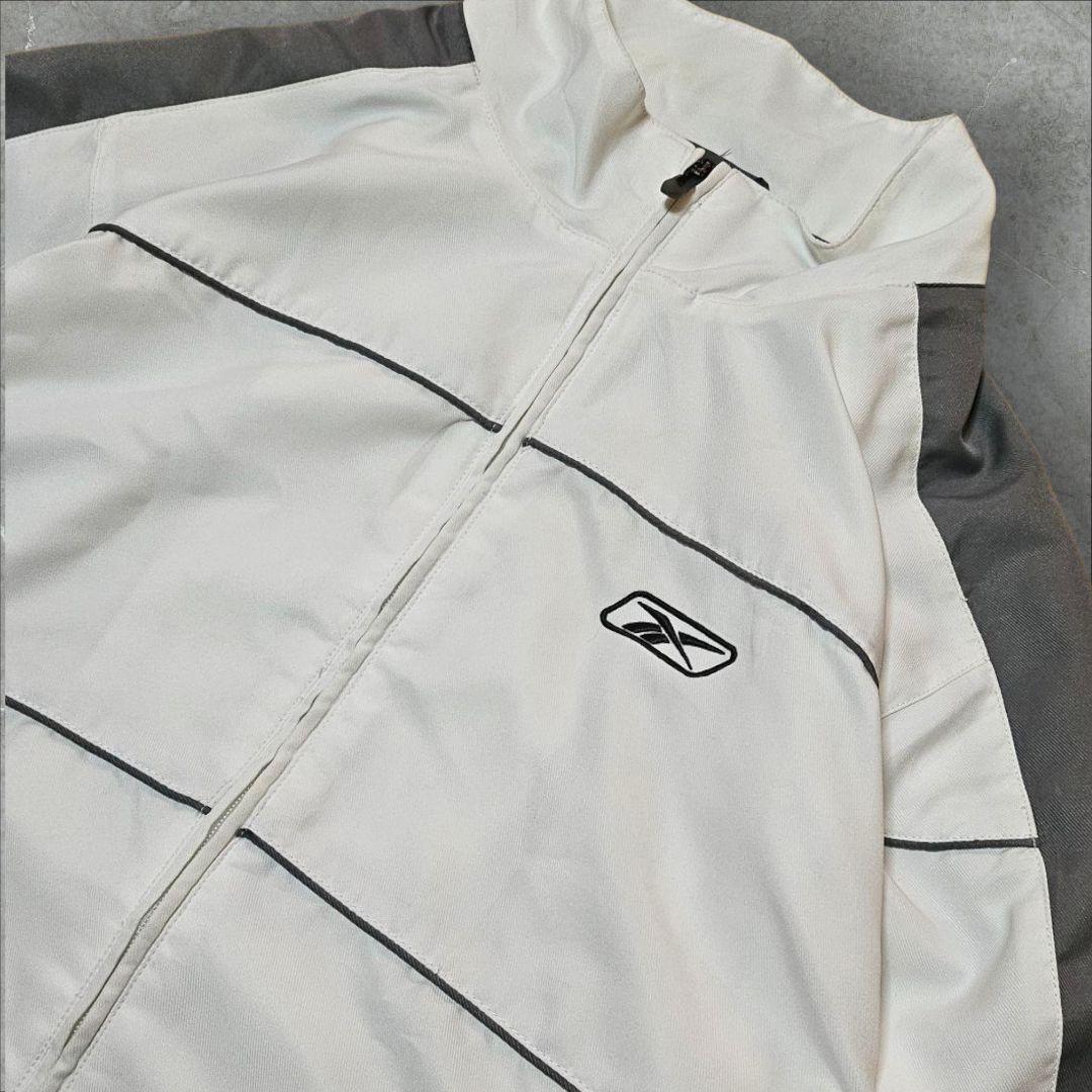 90s Reebok リーボック ナイロンジャケット 刺繍ロゴ 万国旗タグ XL