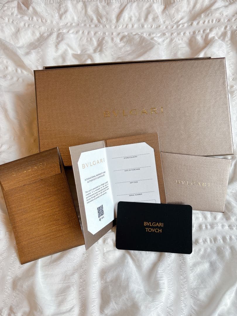 ☆新品未使用☆ BVLGARI 二つ折り長財布 SAFFRON AMBER - メルカリ