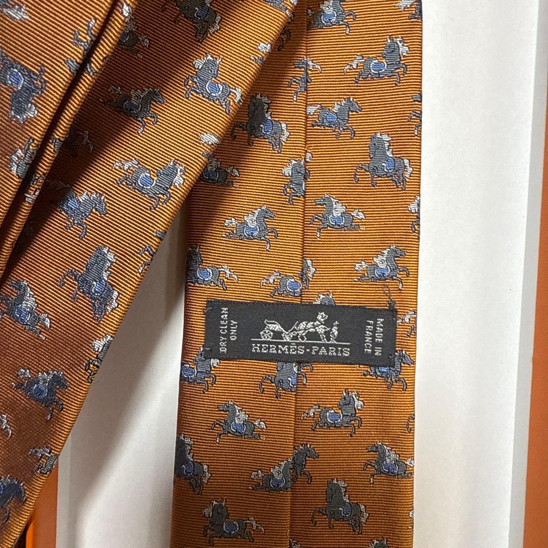 極美品 エルメス ネクタイ オレンジ 馬柄ホース シルクジャガード