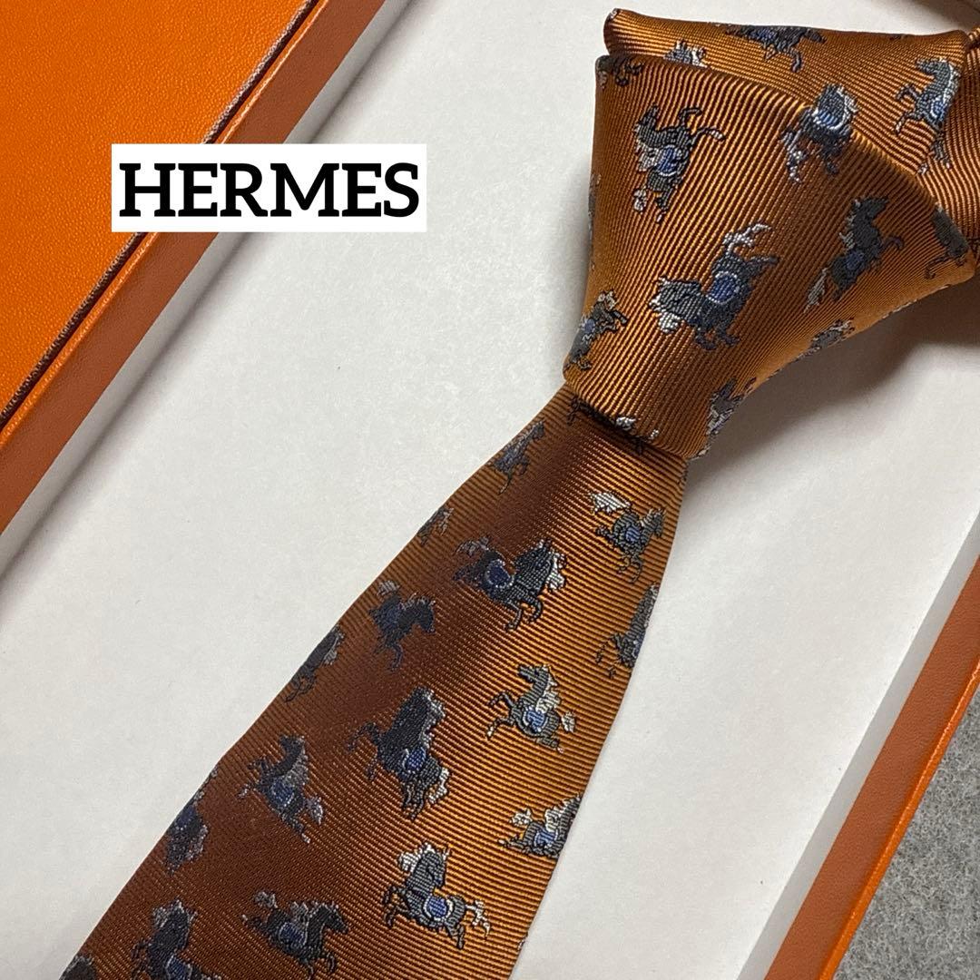 極美品 エルメス ネクタイ オレンジ 馬柄ホース シルクジャガード