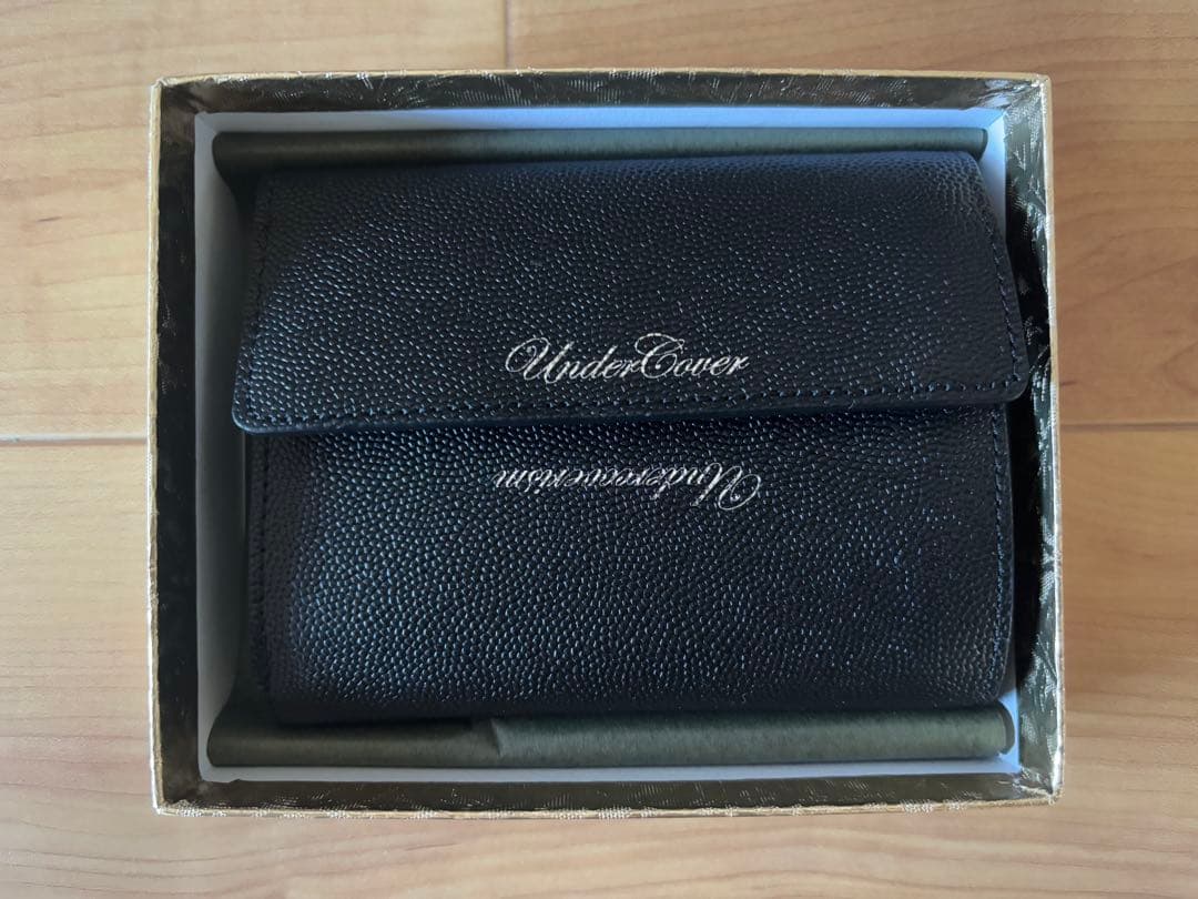 UNDERCOVER 三つ折り財布 UNDERCOVER（アンダーカバー）の「Undercover - プリント 三つ折り財布
