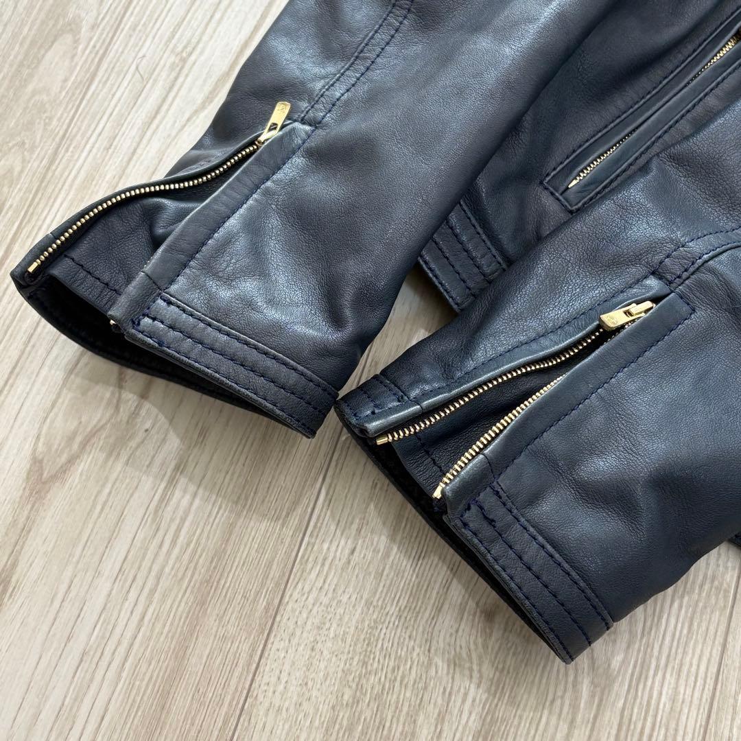 美品】23AW TOMORROWLAND レザージャケット 40 ネイビー - メルカリ